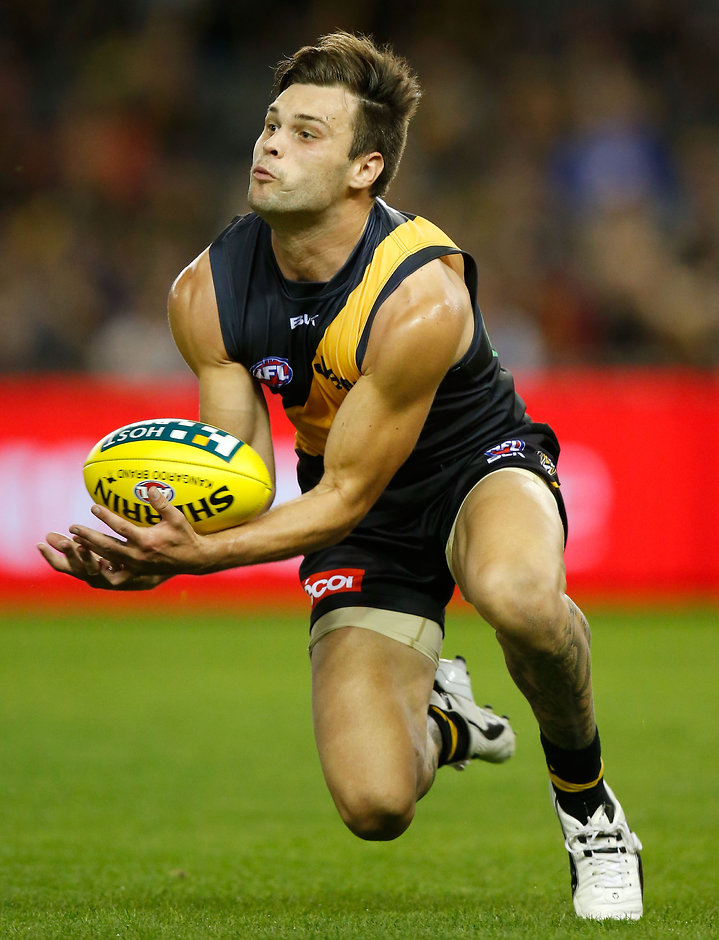 AFL 2016 Rd 03 - Richmond v Adelaide MELBOURNE, AUSTRALIA - APRIL 9: Ben Lennon of the Tigers in action during the 2016 AFL Round 03 match between the Richmond Tigers and the Adelaide Crows at the Etihad Stadium, Melbourne on April 9, 2016. (Photo by Michael Willson/AFL Media)
